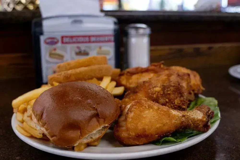 Fried chicken with a sandwich and french fries at Harry's Cafe, Katella Ave, Stanton, CA