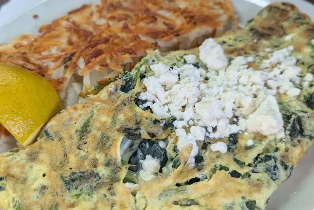 A spinach and feta omelette with hash browns at Harry's Cafe, Katella Ave, Stanton, CA