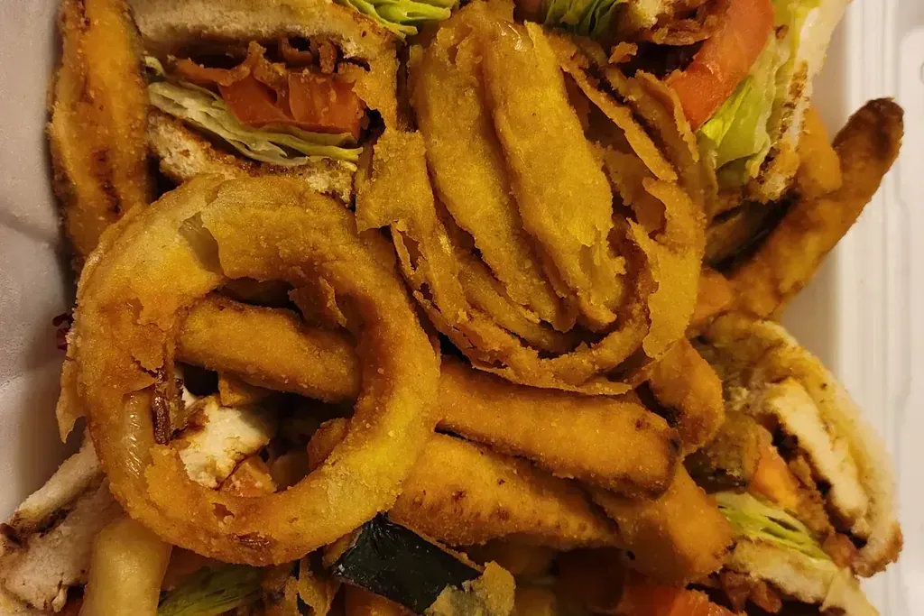 A club sandwich with fried zucchini and onion rings at Harry's Cafe, Katella Ave, Stanton, CA