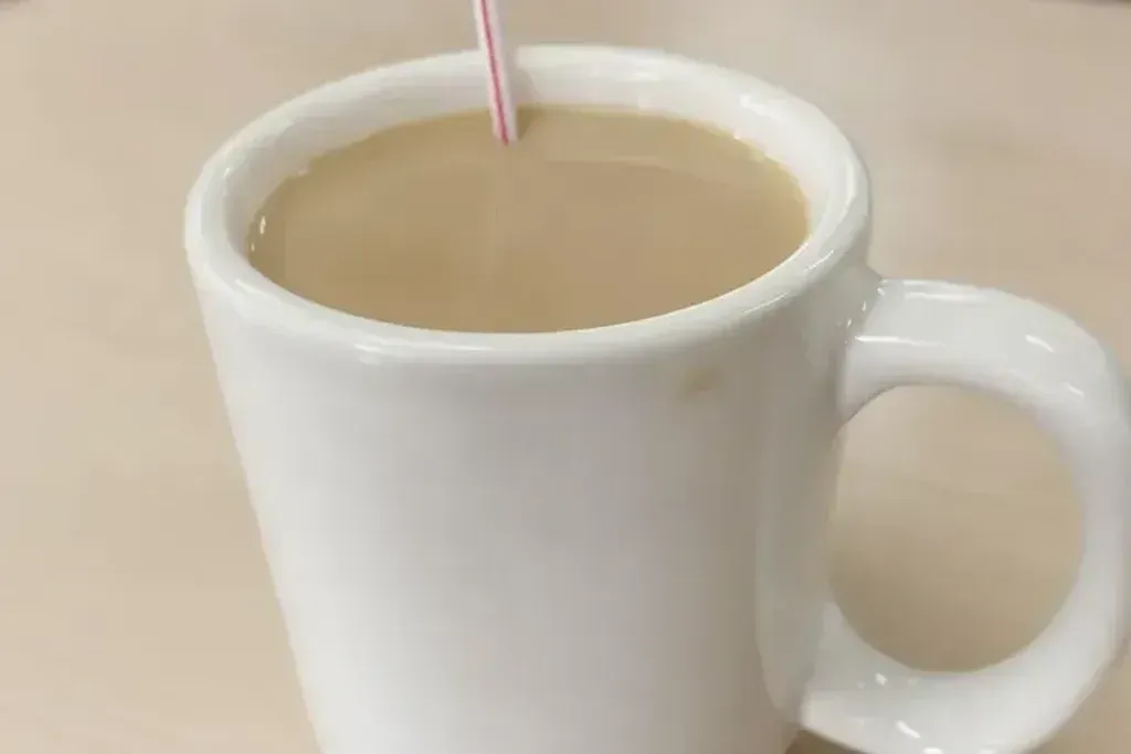 A diner mug of coffee with cream at Harry’s Cafe, Katella Ave, Stanton, CA.