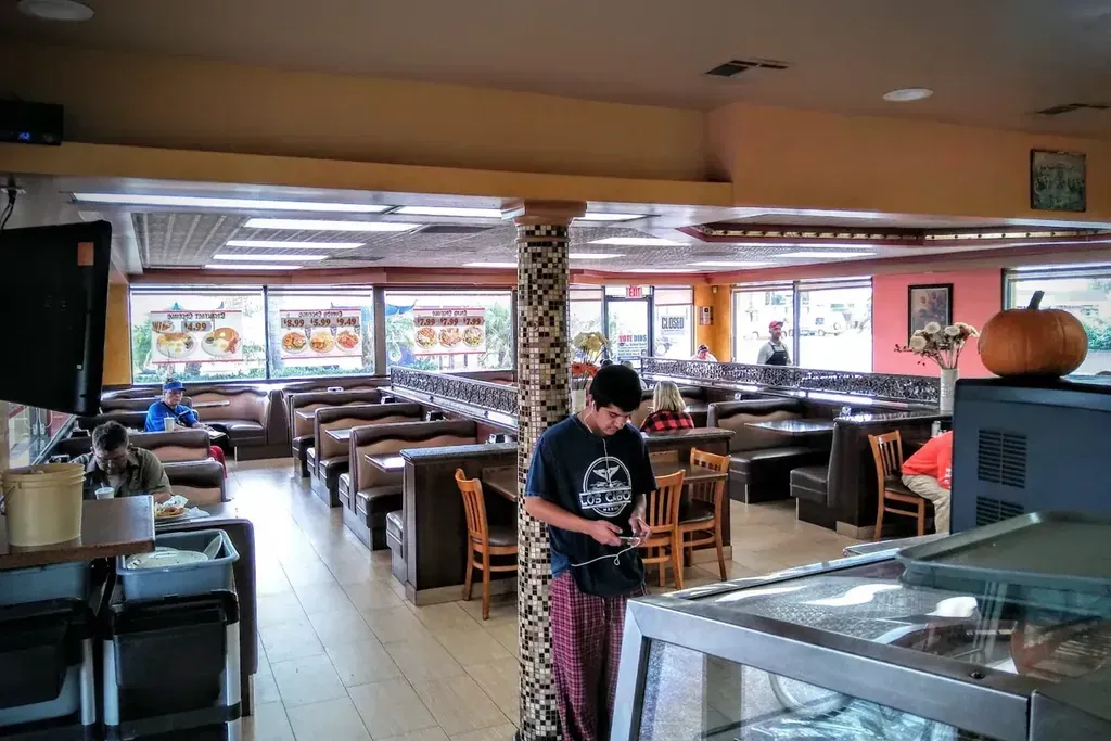 The dining room with booths and tables at Harry’s Cafe, Katella Ave, Stanton, CA.