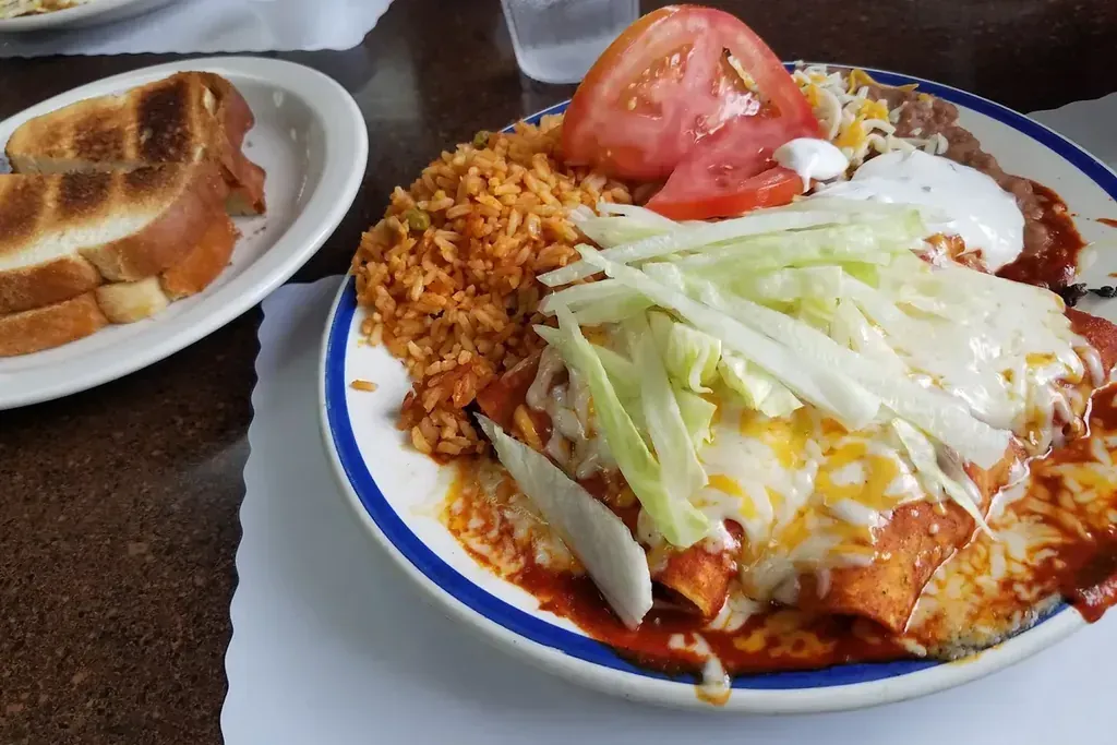 Enchiladas with rice and shredded lettuce at Harry’s Cafe, Katella Ave, Stanton, CA.