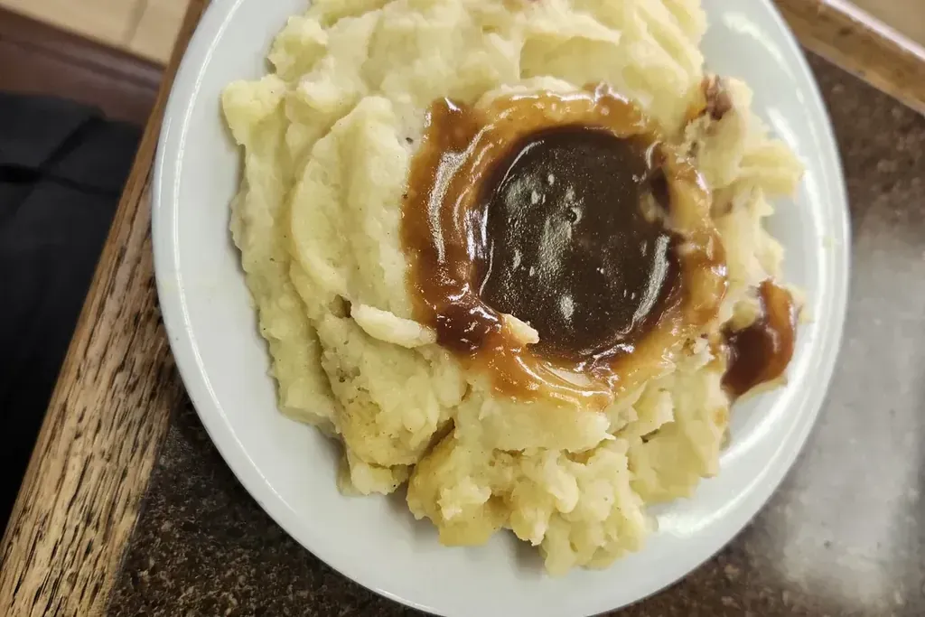 Mashed potatoes with gravy at Harry's Cafe, Katella Ave, Stanton, CA