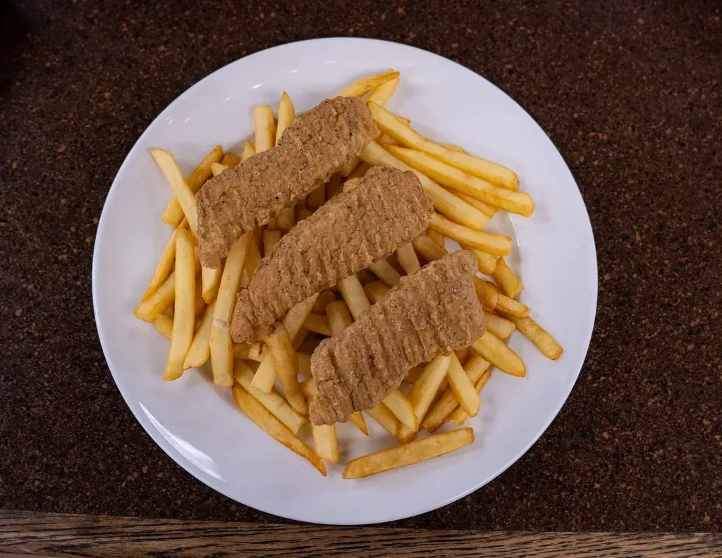 Fried chicken strips and french fries on the kids menu at Harry's Cafe, Katella Ave, Stanton, CA