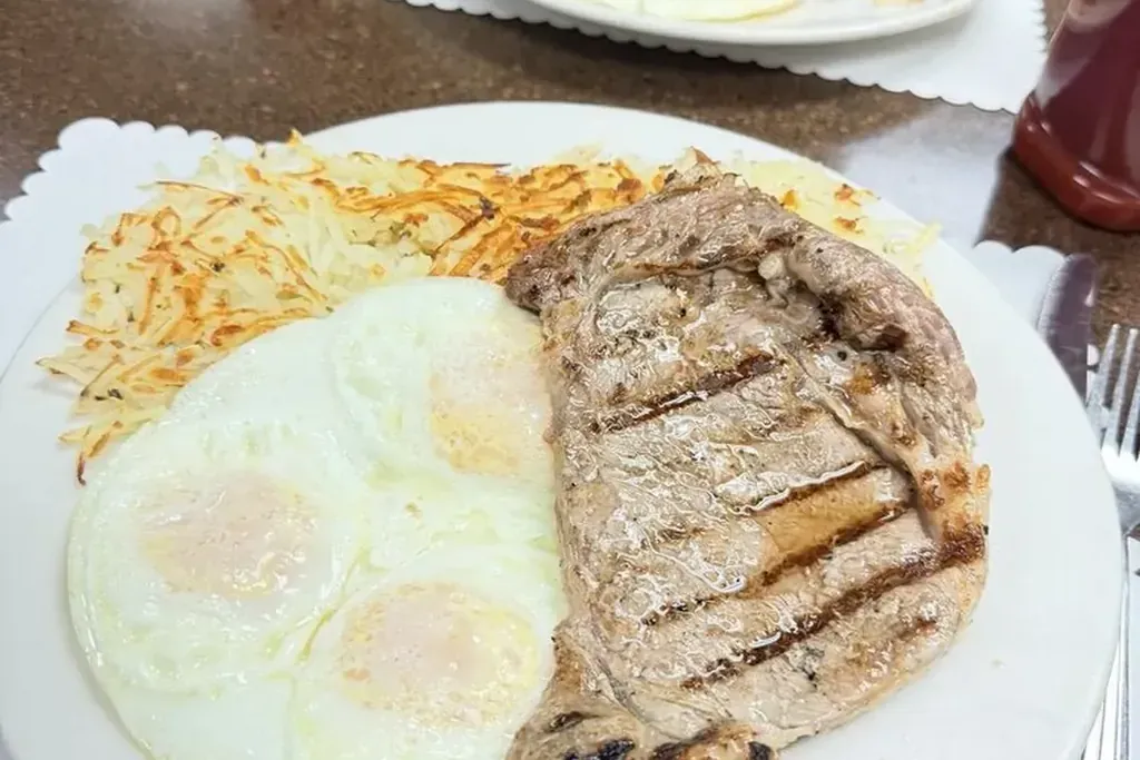 Pork chops with eggs and hash browns at Harry's Cafe, Katella Ave, Stanton, CA